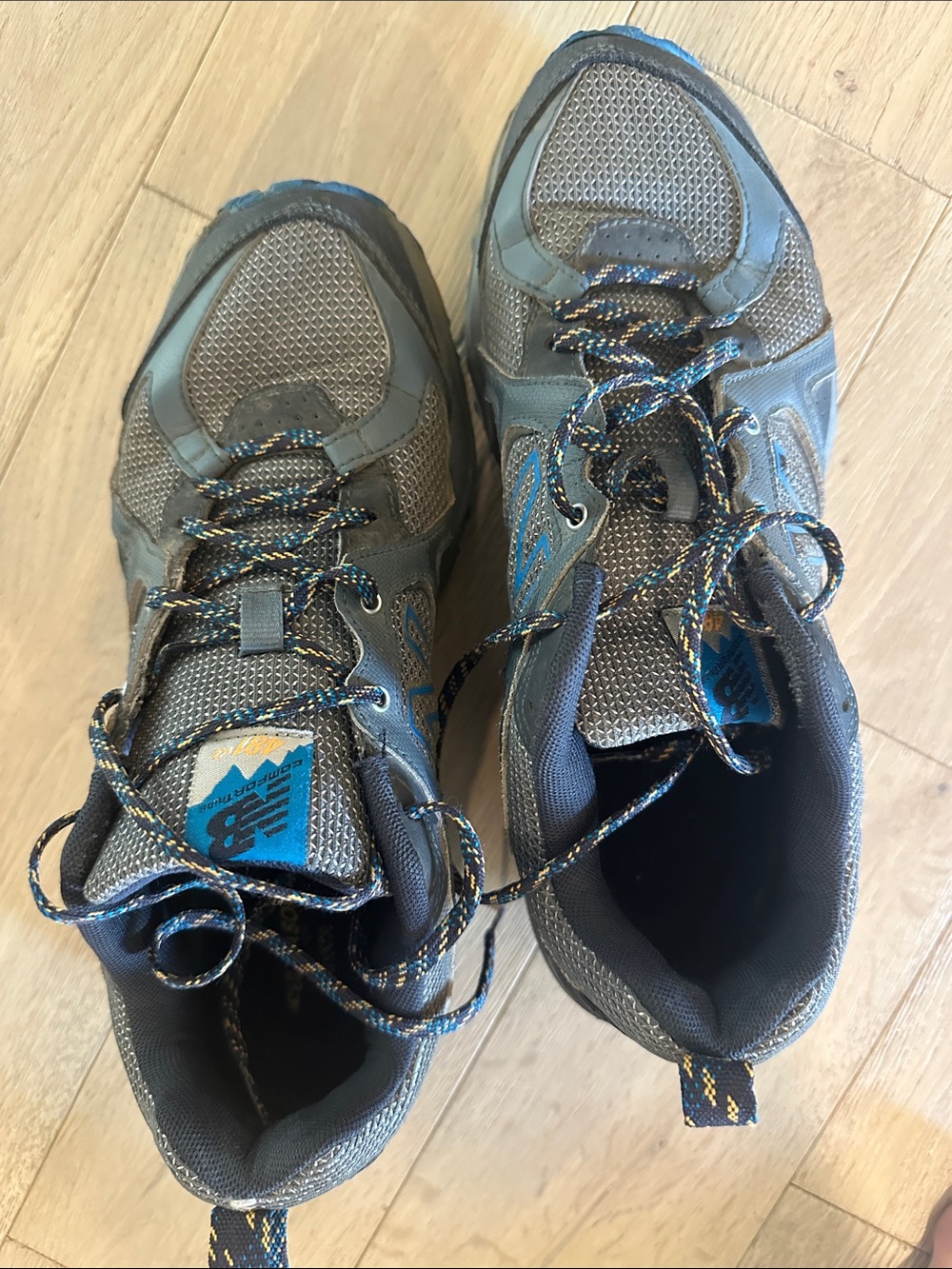 New Balance Men's Athletic Sneakers in Gray with Blue Accents